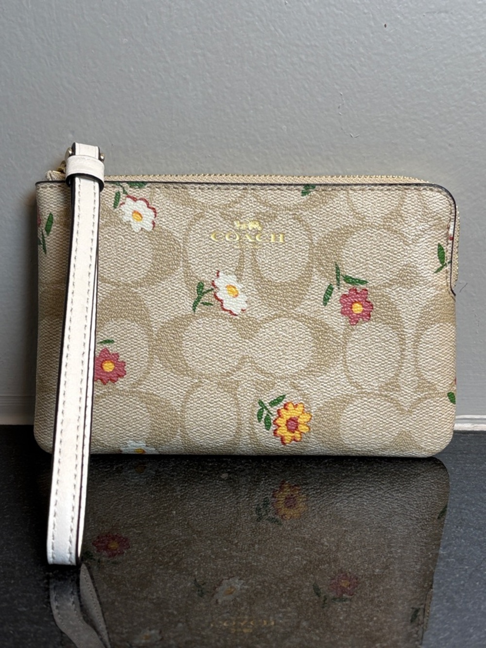 Coach Beige Floral Signature Wristlet with White Strap and Gold Logo